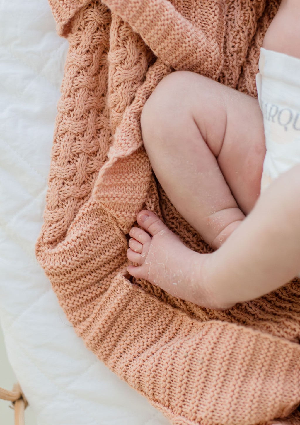 Peach Pink Cotton Baby Blanket with Textured Diamond Knit Pattern